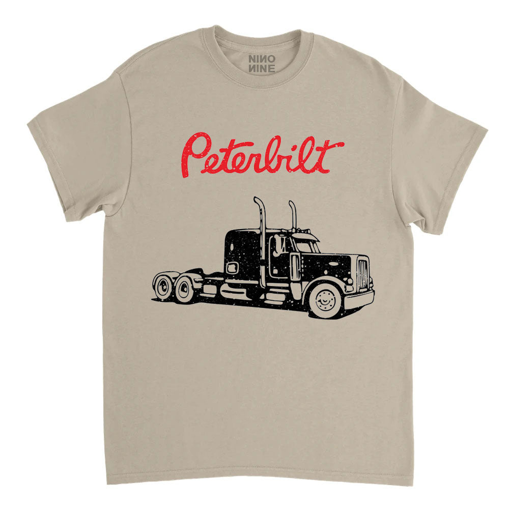 Beige t-shirt with Peterbilt truck graphic and red text on a white background