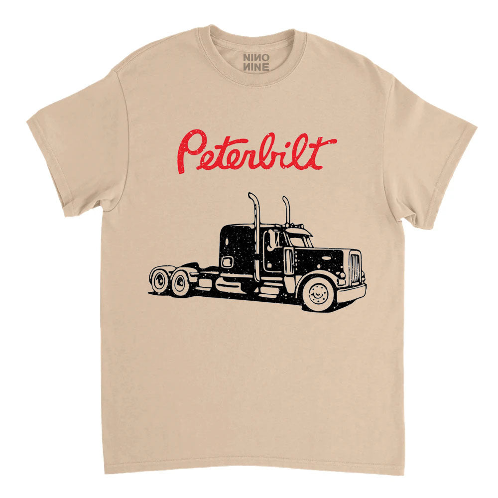 Beige t-shirt with Peterbilt truck graphic and logo on a white background