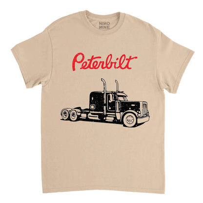 Beige t-shirt with Peterbilt truck graphic and logo on a white background